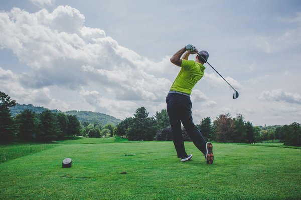 What specific exercises can help golfers improve their swing mechanics?